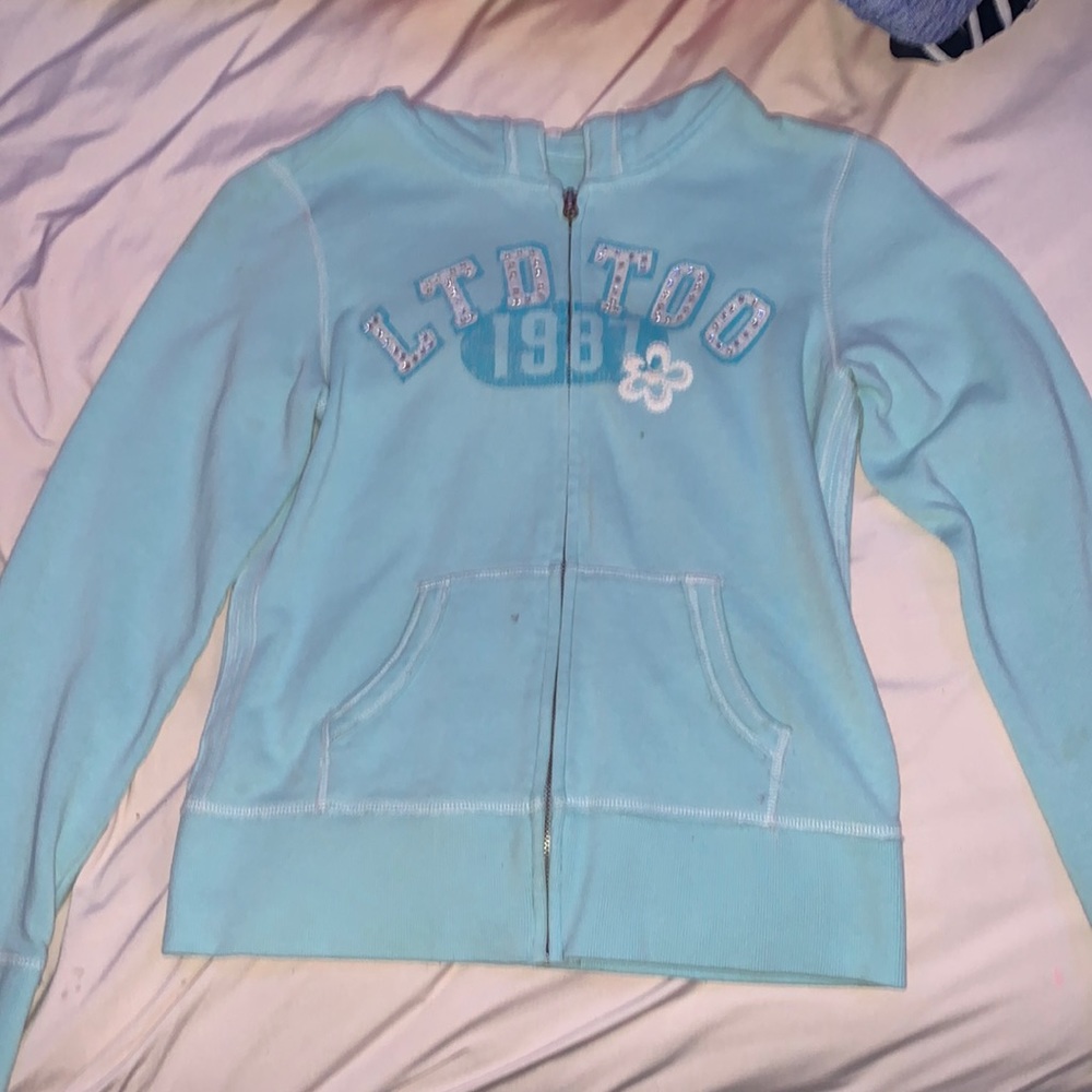 Used light blue girls jacket